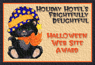 kitten in a teapot -- Holiday Hotel's Frightfully Delightful Halloween Website Award